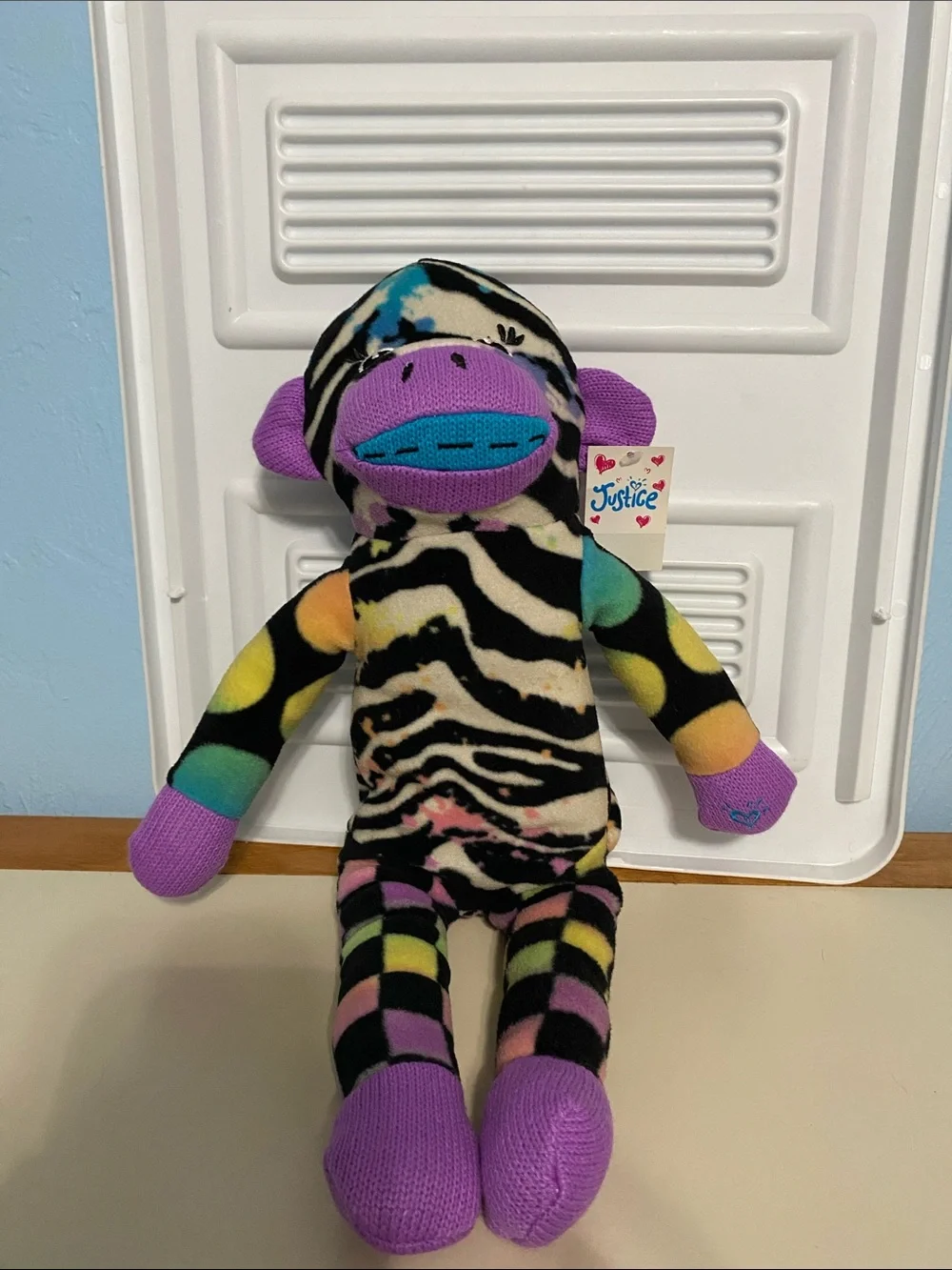 Justice Multicolor Zebra-Print Sock Monkey Plush with Purple Accents New